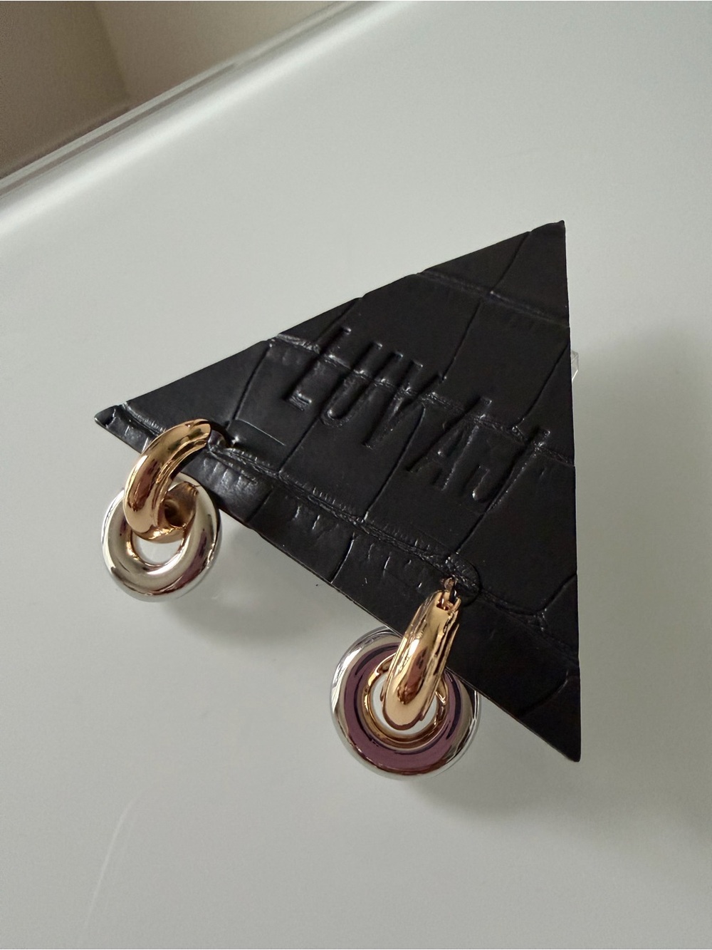 Luv Aj gold silver two tone interlock hoop earrings